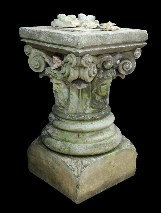 A pair of late Victorian composition stone capitals, W.1ft 10in. D.1ft 10in. H.3ft 3in.